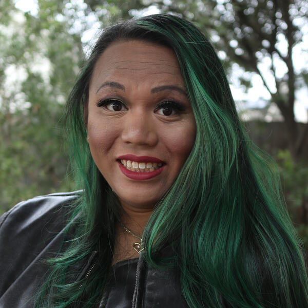 A photo of Dom Dinh. The photo leads to her website.