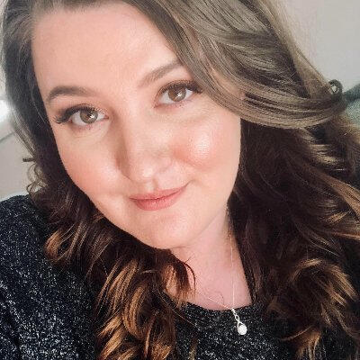A photo of Aimee Smith. The photo leads to her website.